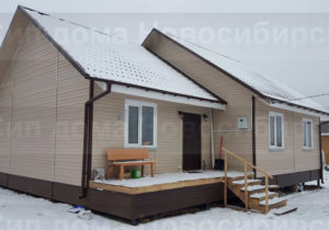 Фото готового каркасного дома из СИП панелей по проекту 27 (103 м2) с внешней отделкой под ключ (Новосибирск)